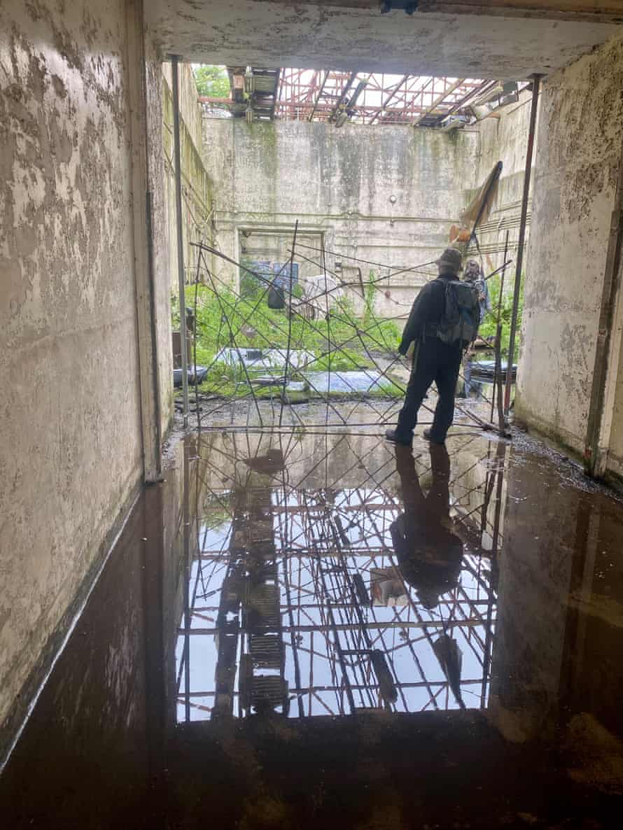 Colin Saunders inspecting one of the former atomic warfare research facilities on Orford Ness. UK.