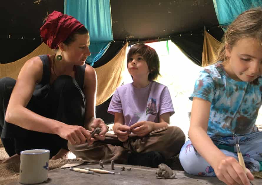 Anu (left), the event’s host, with the writer’s daughter and her friend in the kids craft tent.