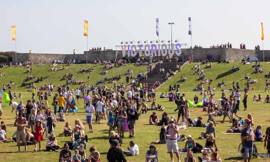 Victorious Festival landscape with people sunbathing and enjoying bands