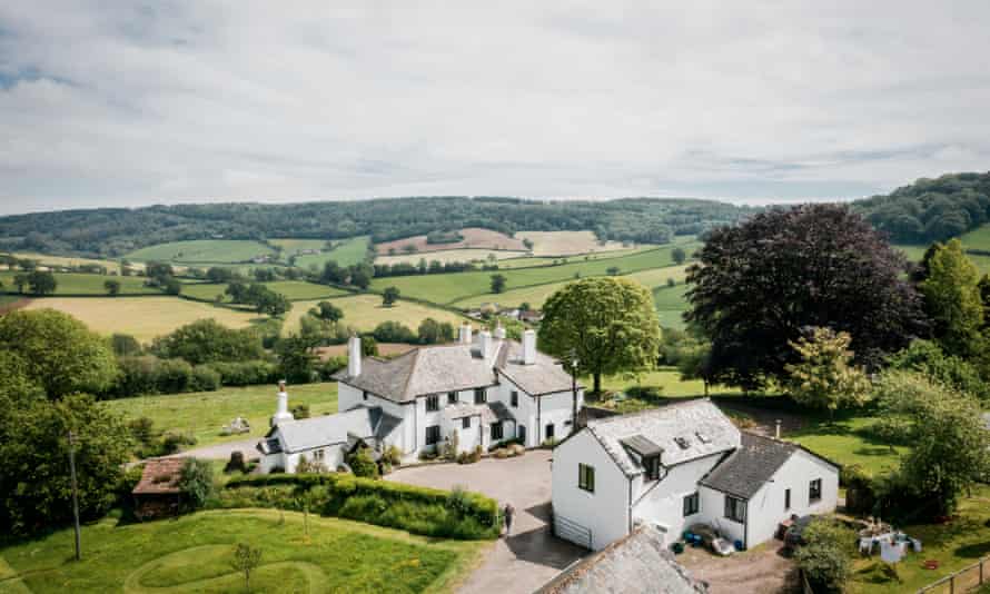 White houses in rolling green fields