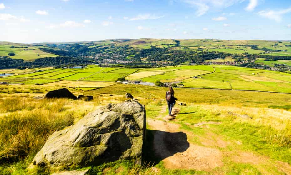 Walker on the moors above Todmorden.