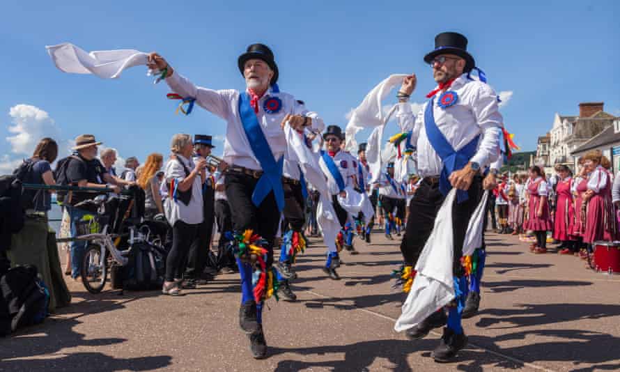 Morris men on the seafront at Sidmouth during the folk festival.