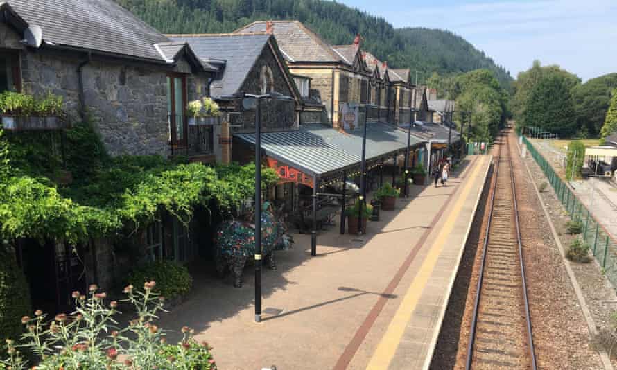 Betws y-Coed station, with flowers and art gallery.