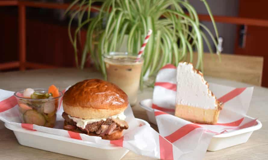 salt beef and cream cheese bun in takeaway box