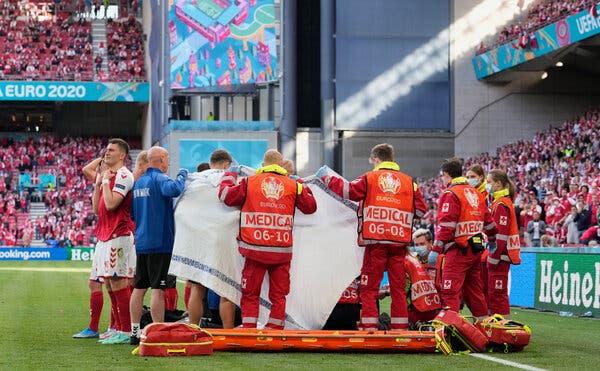 Medics surrounded Christian Eriksen during the Euro 2020 Championship Group B match between Denmark and Finland on Saturday. He was resuscitated.