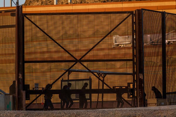 Migrants crossed the Rio Grande River at Ciudad Juárez, Mexico, in March, trying to request asylum from U.S. Border Patrol agents.