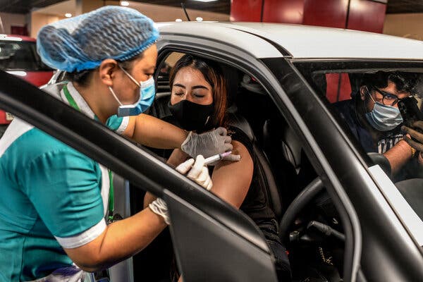 A drive-in Covid-19 vaccination center in New Delhi. Accounts based in Russia spread vaccine misinformation in India, Latin America and the United States, Facebook said.