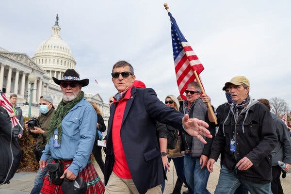 Michael T. Flynn, center, at a Dec. 12 rally in Washington to protest the presidential election results.