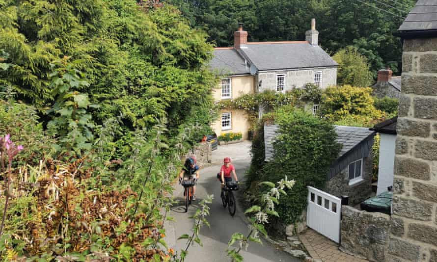 Rob Penn (freelance) and Sophie Gordon (Cycling UK) cycle along winding country lanes near Lamorna during a recce ride of Cycling UK’s West Kernow Way, June 2021. The 230km route is part of the EU-funded EXPERIENCE project to develop sustainable year-round tourism activities in Cornwall.