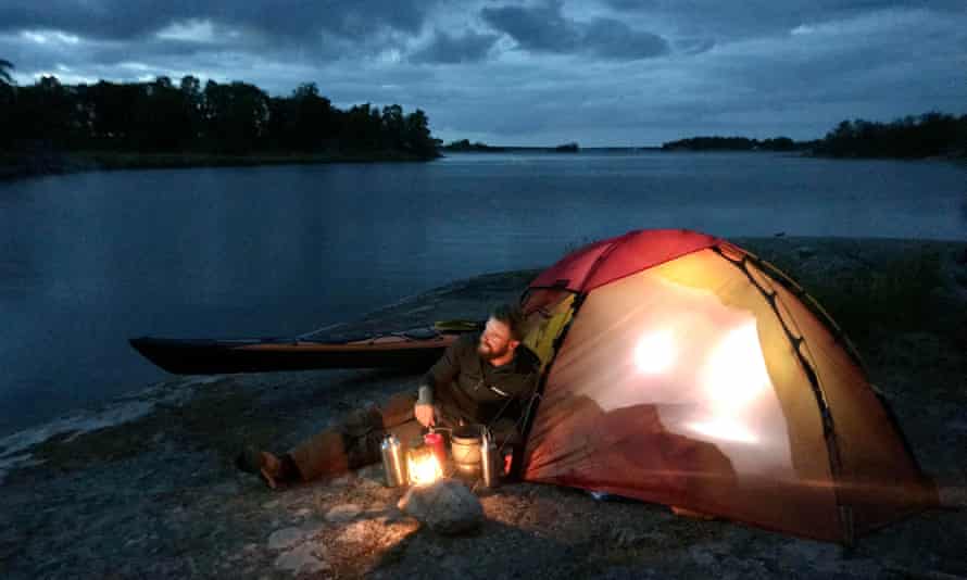 Guide Thomas camping on one of the islands.