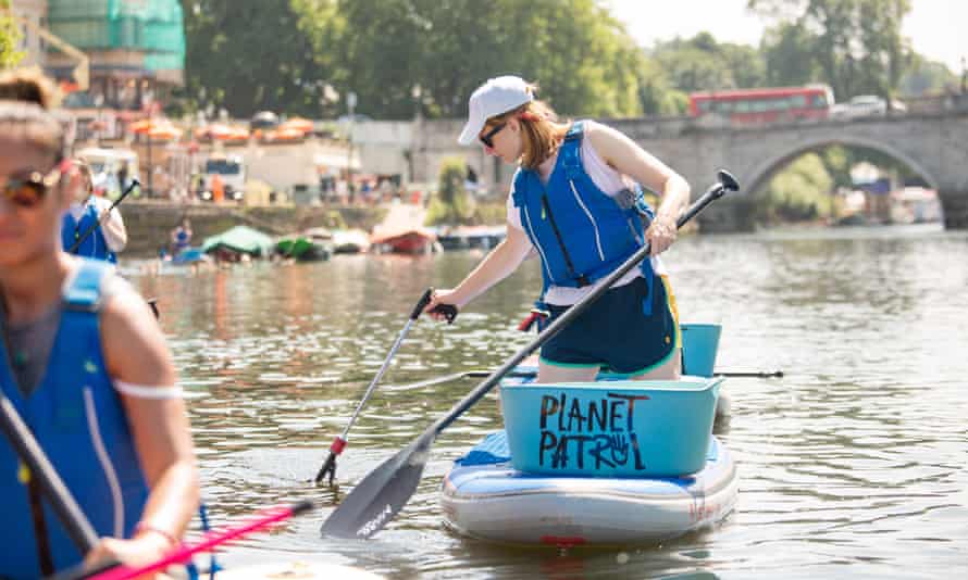 Paddleboarding clean up, River Thames On Planet Patrol’s clean ups, participants paddleboard, parkour and yoga their way to plastic-free beaches and rivers