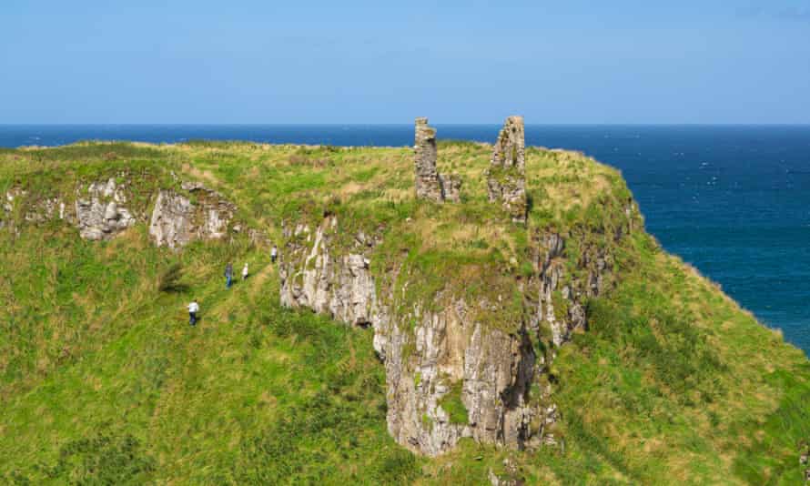 Walkers climb up to Dunseverick Castle.