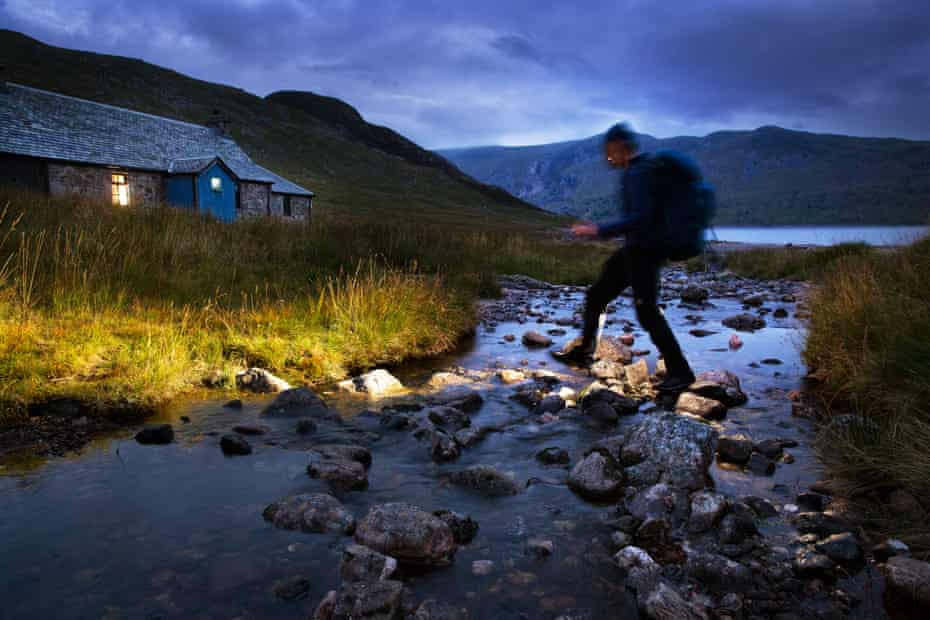 A walker arrives at nightfall - Ben Alder Cottage beside Loch Ericht