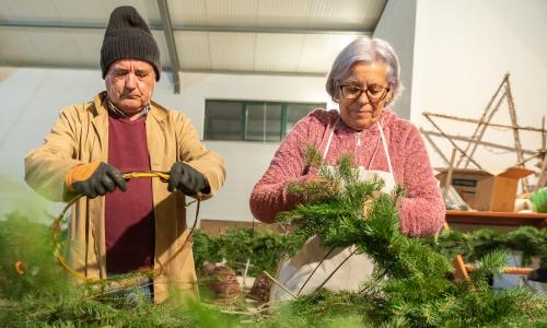 Villagers create decorations.