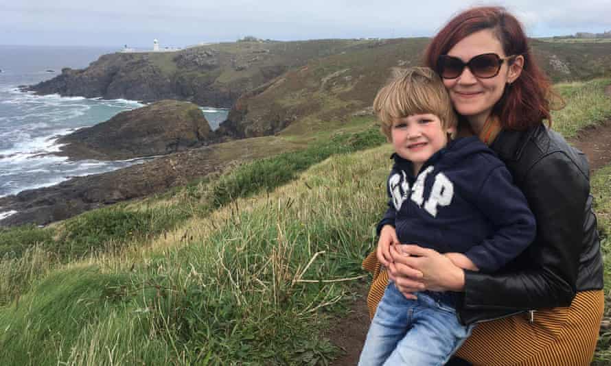 Sally Howard and son at Pendeen, with the lighthouse in the distance