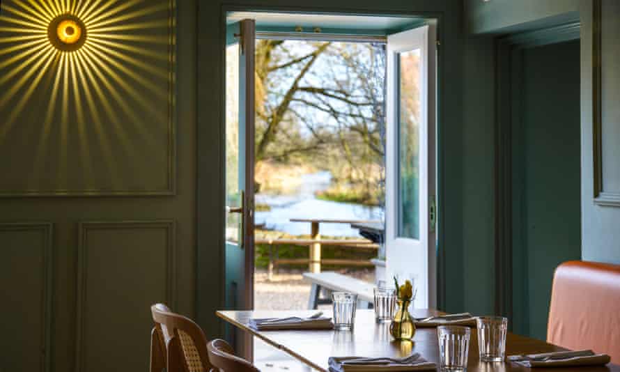 The dining room has a view of the River Wensum.